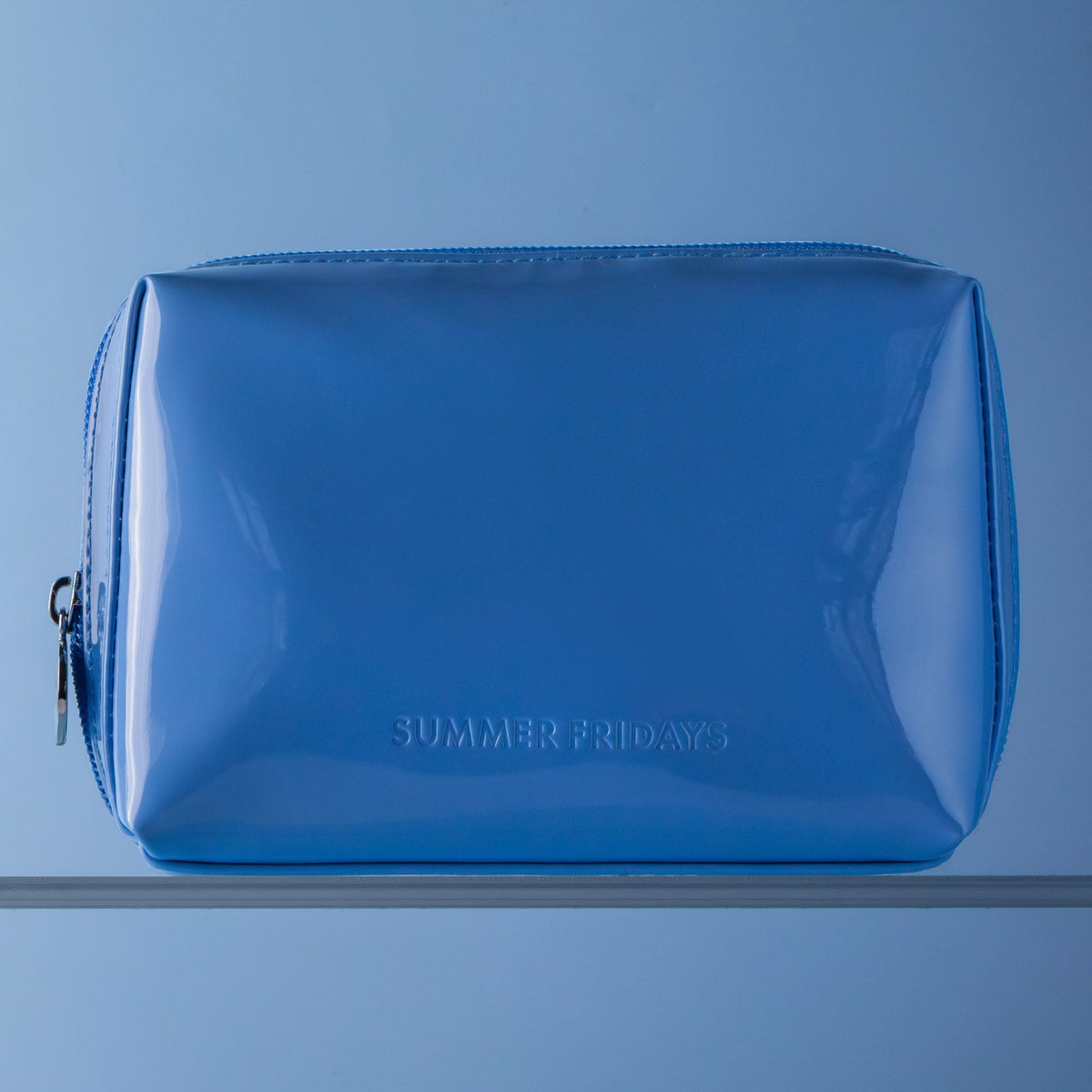 glossy-pouch-in-jet-lag-blue-h3 Glossy-Pouch-Jet-Lag-2.jpg