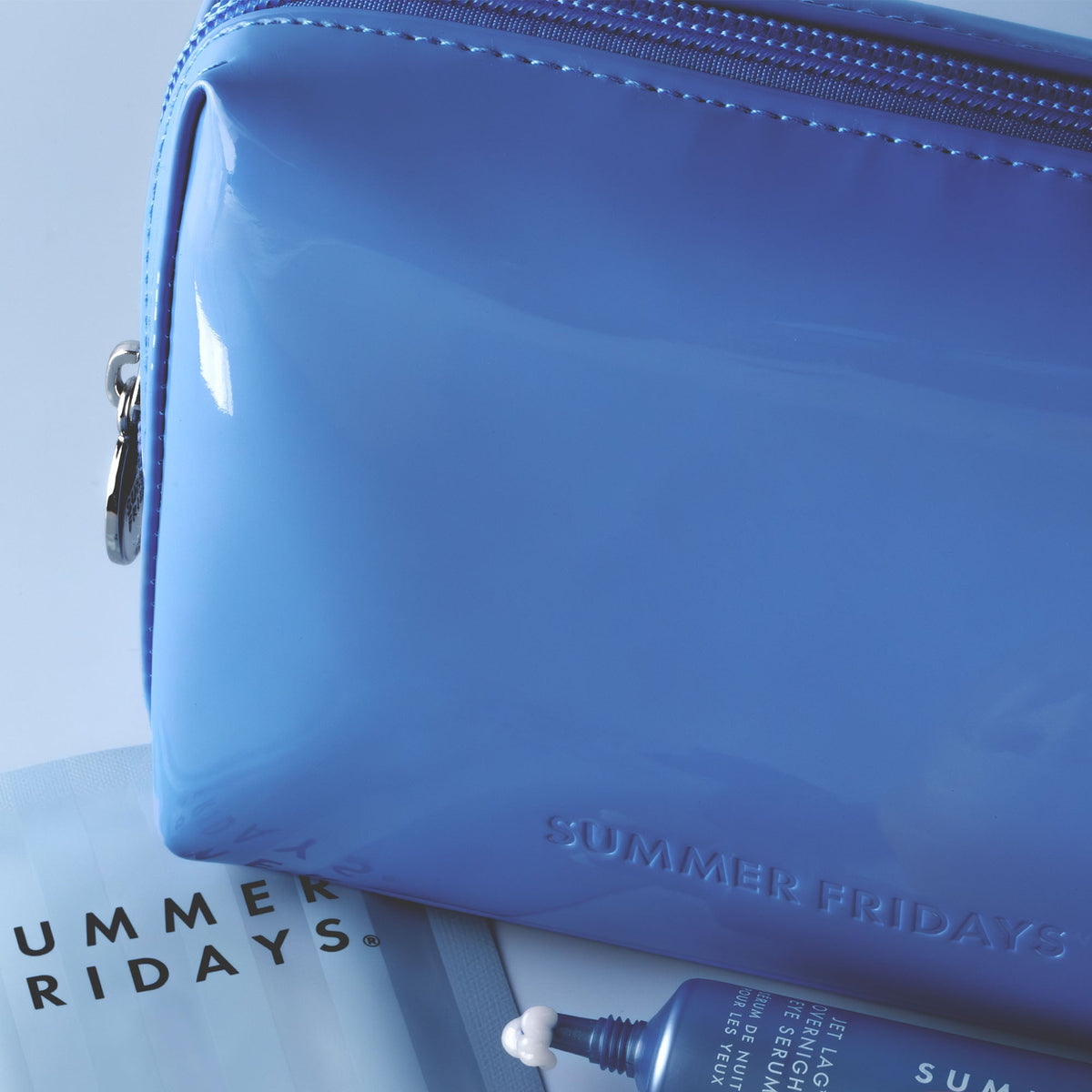 glossy-pouch-in-jet-lag-blue-h3 Glossy-Pouch-Jet-Lag.jpg